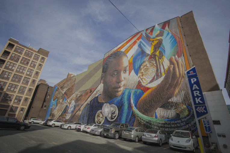 A mural, produced in conjunction with 5 Philadelphia public schools, shines a light on slavery and the Holocaust.