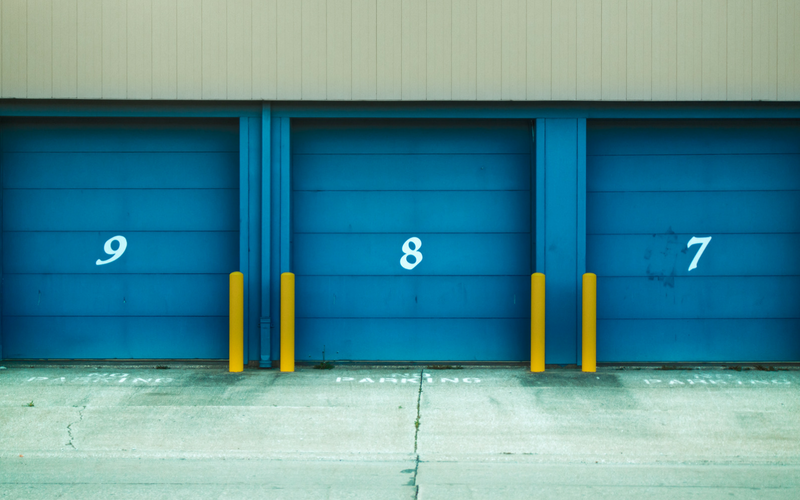 A storage facility is shown with numbered doors.