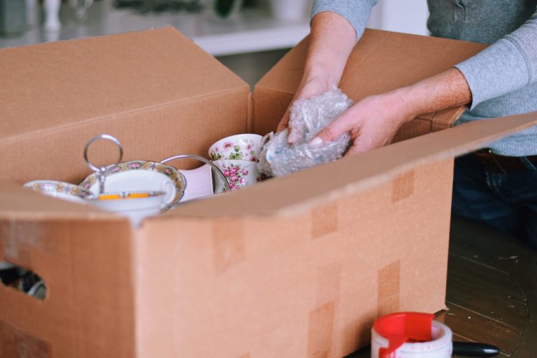 Packing items in a box.